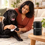 A gentle paw-cleaning routine with a black Labrador